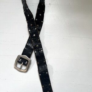 Lucky Black leather belt with scalloped leather, silver tone buckle.